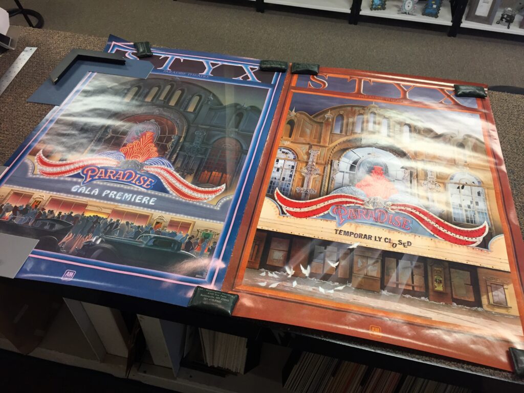 Styx "Paradise Theater" posters laid out for dry mounting