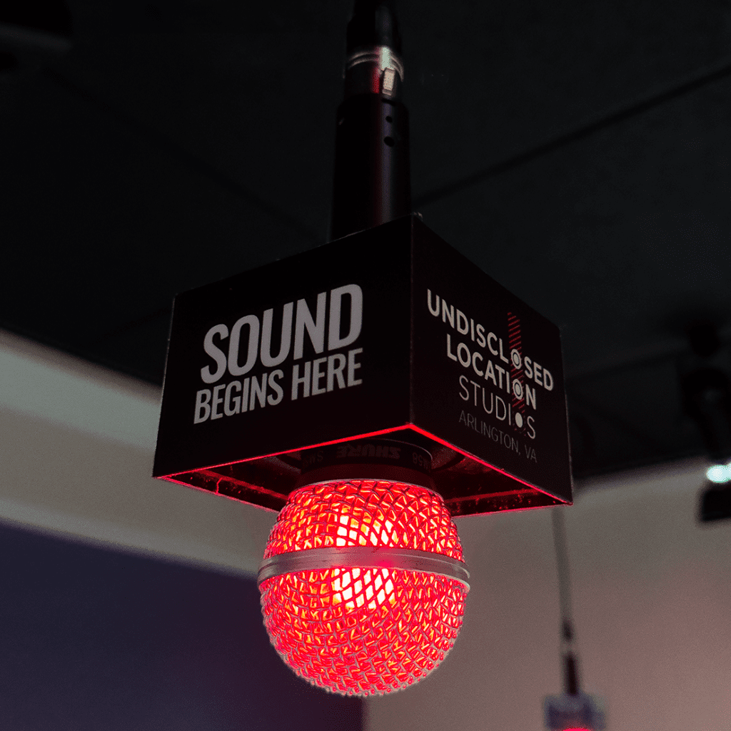 closeup of a converted microphone pendant light in the studio lobby