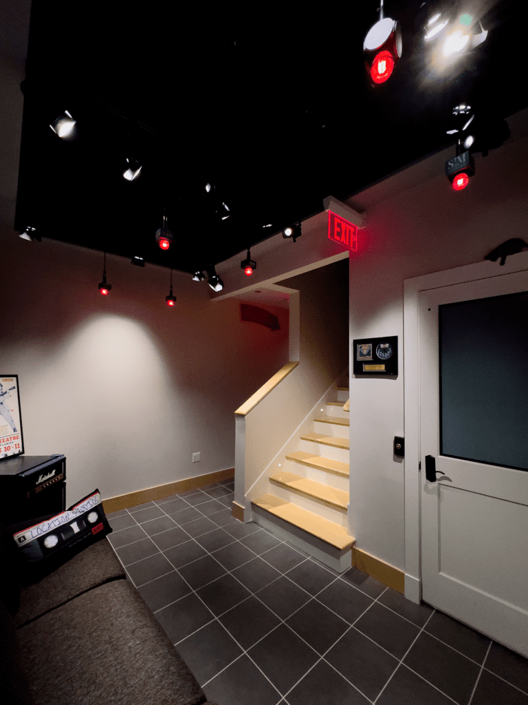 An overall view of the Undisclosed Location Studios lobby, showing the hanging SM58 pendant light fixtures