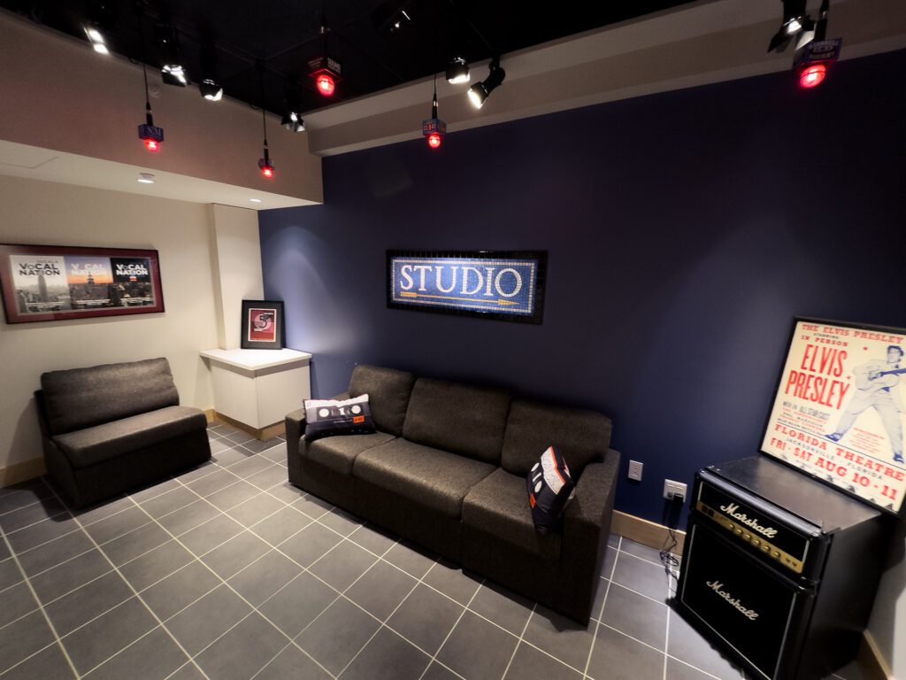 Overall view of the ULS studio lobby with STUDIO sign on the wall