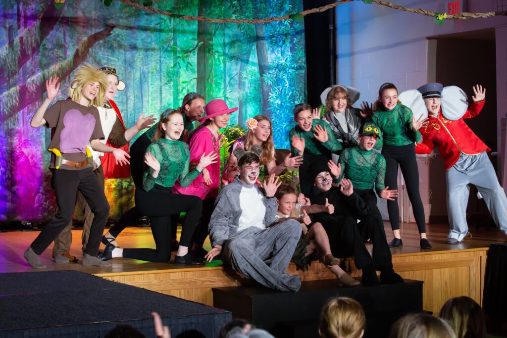 The cast of St. Patrick's production of The Jungle Book on stage